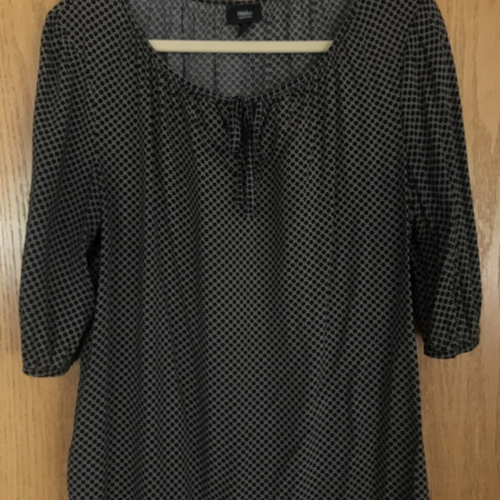 Shirt with ties in front.